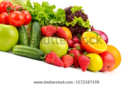 Isolated fresh fruits and vegetables on white