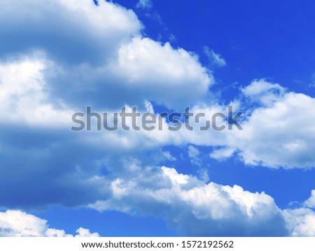 Blue sky and white cloud background.