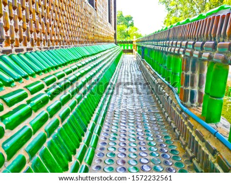 This is  amazing  million bottles temple. The part of building made withe bottles, 
bottles in temple about 1,500,000 peaces.  it's the best way to reused the bottles  again.