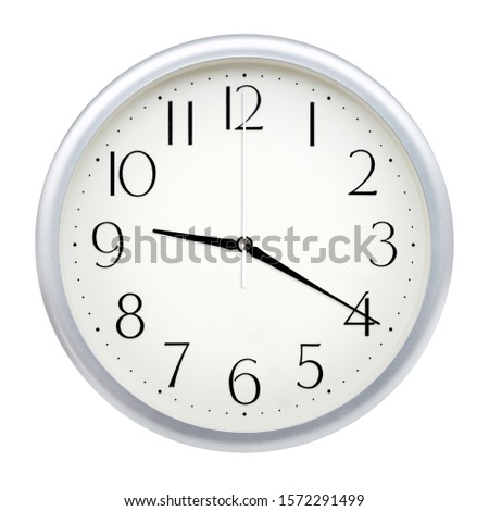 Analog wall clock isolated on white background. Royalty-Free Stock Photo #1572291499