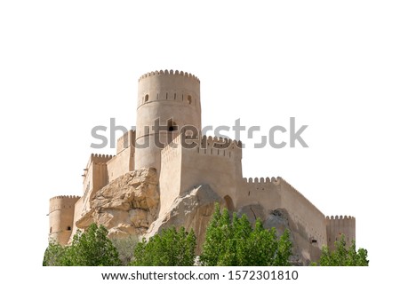 Fort Nakhal, a fortification in Al Batinah Region of Oman, isolated on white background Royalty-Free Stock Photo #1572301810