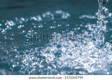 Macro bubbles of water on blue background
