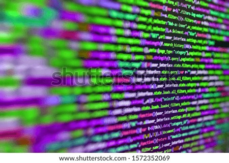 Software technology background showing programming source code on computer screen.