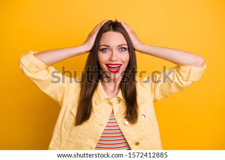Photo of cheerful cute nice pretty girl holding head unable to believe in sales started expressing emotions on face fun isolated vivid color background