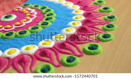 [object Object]this is very colourful ringoli design and art  Royalty-Free Stock Photo #1572440701