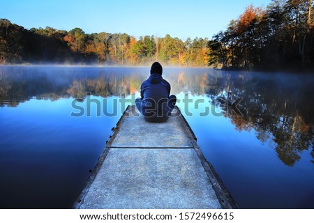 Early Morning Solitude on Lake Norman Royalty-Free Stock Photo #1572496615