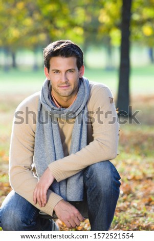 Mid adult man in autumn forest
