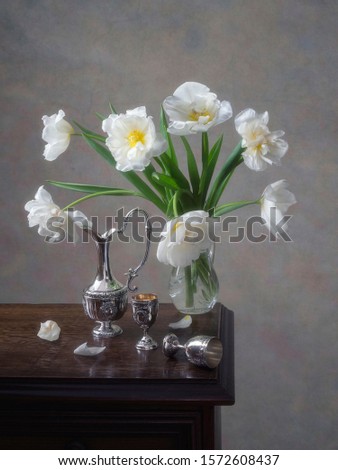 Still life with bouquet of white tulips