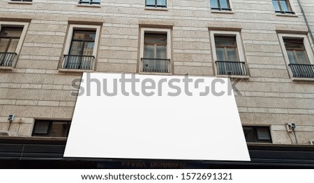 Large City White Blank Advertisement Billboard Banner Sign On A Building .Mock Up Isolated Template Clipping Path