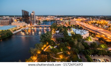 Movies on the Grand River in Grand Rapids, Michigan at night Royalty-Free Stock Photo #1572691693