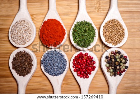 collection set of spices with beans, legumes, peas, chopped parsely, lentils, poppy and pepper