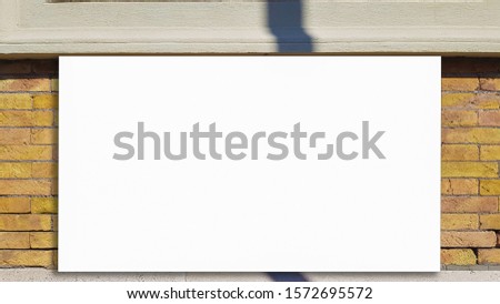 White Blank Advertisement Billboard Banner Sign On A Yellow Building Wall .Mock Up Isolated Template Clipping Path