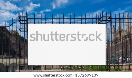 White Blank Advertisement Billboard Banner Sign On A Metal Fence
 .Mock Up Isolated Template Clipping Path