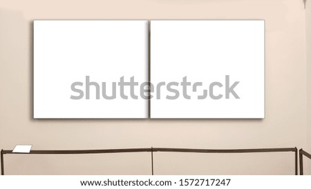Two Empty Modern Photo Frames On The Beige Wall At Art Museum.White Blank Advertisement Banner Mock Up Isolated Temp