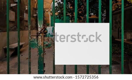 White Blank Advertisement Billboard Banner Sign On A Metal Fence
 .Mock Up Isolated Template Clipping Path