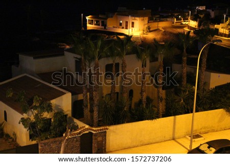 The pristine night lights of peaceful La Caleta, Costa Adeje, Tenerife, Canary Islands, Spain.