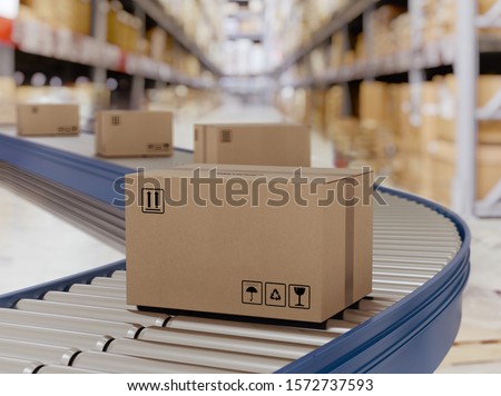 Cardboard boxes on conveyor rollers ready to be shipped by courier for distribution. Royalty-Free Stock Photo #1572737593