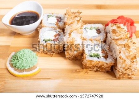 Dried tuna breading roll with various fillings. Close-up.