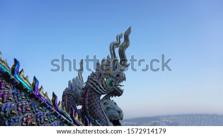 Image of serpent with monster name's See Hoo Ha Ta.In lagend of Bhuddha story inThailand. Royalty-Free Stock Photo #1572914179