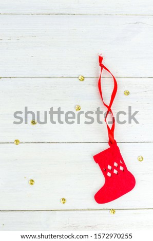 Christmas. New Year. Background. red sock on a white background