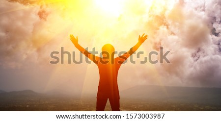 A man with both arms raised Royalty-Free Stock Photo #1573003987