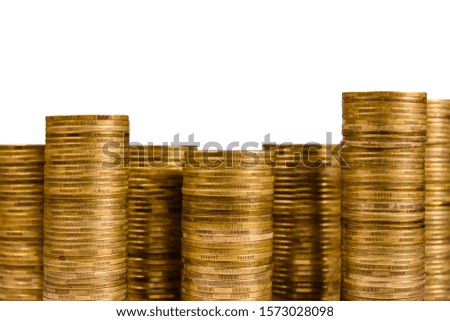 Stacks of the coins isolated on white background