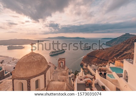 Peaceful evening view of Santorini island. Picturesque spring sunset on the famous Greek resort Fira, Greece, Europe. Traveling concept background. Artistic style post processed photo.