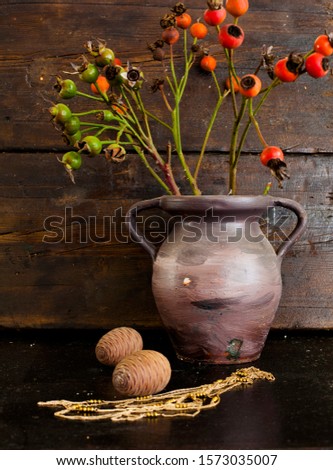 Still life with vases and dried flowers