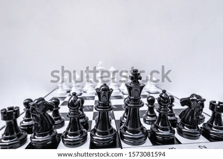 The chess board shows leadership, followers and business success strategies.