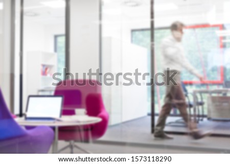 Photo of real life busy workplace