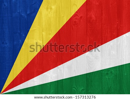gorgeous Seychelles flag painted on a wood plank texture