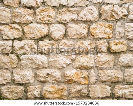 Texture of old rusty stone wall in abandoned buildings 