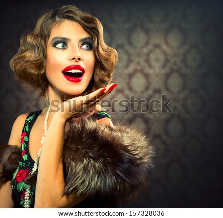 Retro Woman Portrait. Surprised Luxury Lady. Beautiful Woman. Vintage Styled Photo. Old Fashioned Makeup and Finger Wave Hairstyle. 20's or 30's style. Space for your text