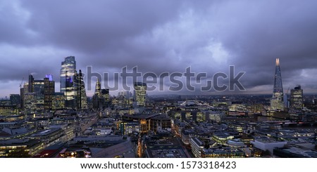 Panoramic aerial view over London city at night