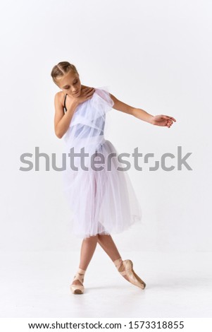 Woman ballerina dance exercises classic style