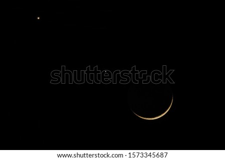 Moonset 4.4% close jupiter planet and Venus planet in dark sky background, real time taken 6.34 pm., November 28, 2019.