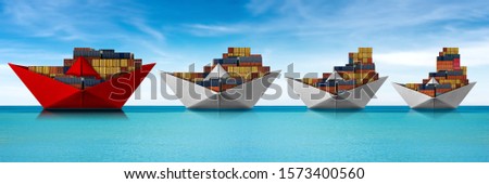 Shipping concept - Paper boats, four cargo container ships in the turquoise sea with blue sky and clouds