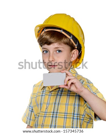 Cute kid while wearing construction helmet with holding blank white card to write it on your own text, isolated on white background