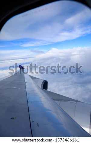 View of cloud and twilight from the window of airplane