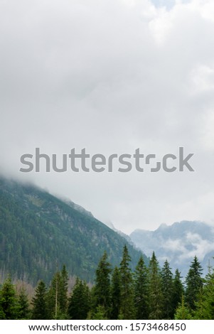 Tatra mountains covered with clouds and thick fog
