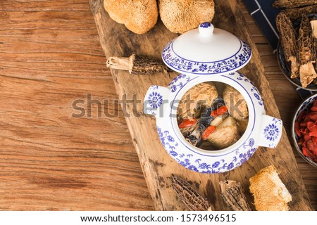 Hericium mushroom black chicken stew, Chinese cuisine