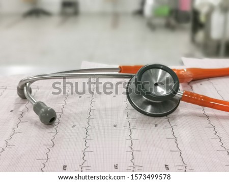 ECG photo effect with stethoscope Placed on the ECG And photos cannot be identified by anyone.