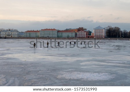 People walk on the thin ice of the Neva in St. Petersburg