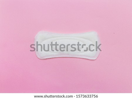 
daily women's pad on a pink background