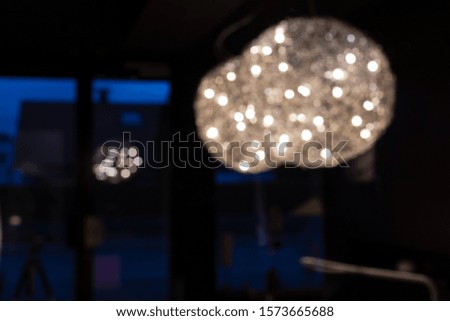 light surface reflections in a dark room