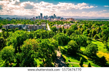 Denver Colorado green trees cover landscape east of Downtown Denver aerial drone view of Colorado Summer 