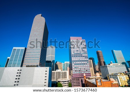 looking up at blue sky downtown Denver Colorado skyline cityscape perfect sunny afternoon 