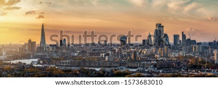 Panoramic, elevated view to the skyline of London during a autumn sunset, United Kingdom