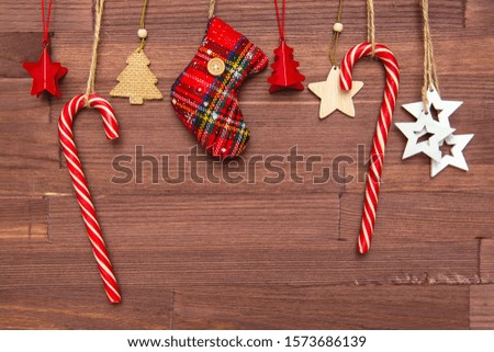 Christmas decorations and accessories on a dark wooden background 