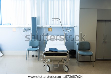 Recovery Room with beds and comfortable medical. Interior of an empty hospital room.
 Royalty-Free Stock Photo #1573687624